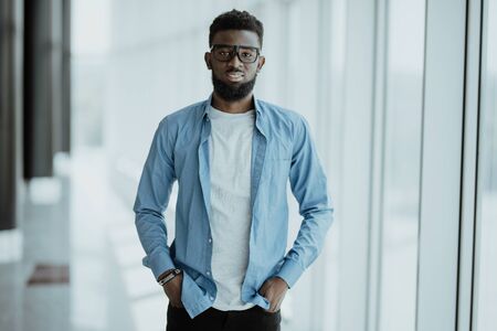 Handsome African American businessman near business centre