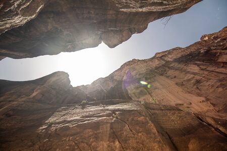 The Siq, the narrow slot-canyon that serves as the entrance passage to the hidden city of Petra,...