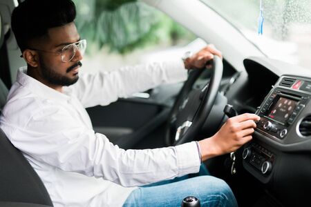 Man is going to drive, looking for some nice music