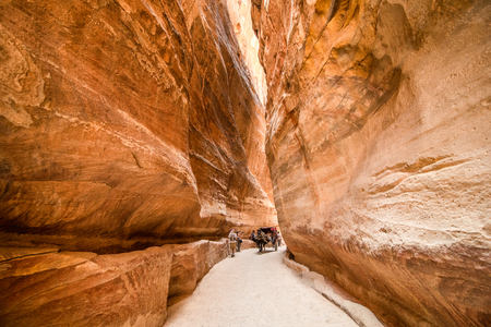 The Siq, the narrow canyon that serves as the entrance passage to the hidden city of Petra, Jordan. This is an UNESCO World Heritage Siteのeditorial素材