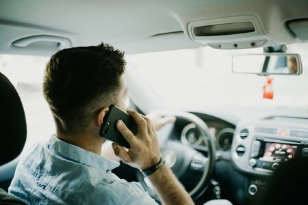 transport, business trip, technology and people concept - close up of young man with smartphone...