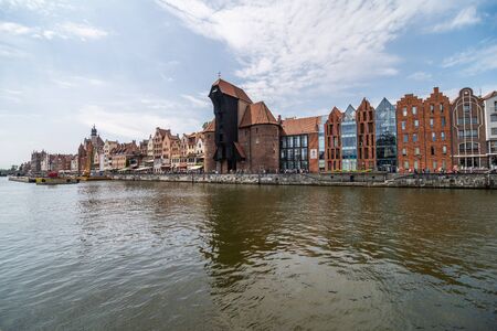 Gdansk, Poland - Juny, 2019. Gdansk old town and famous crane, Polish Zuraw. View from Motlawa river. The city also known as Danzig and the city of amber.のeditorial素材