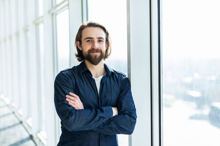 Portrait of young happy smiling business manの写真素材