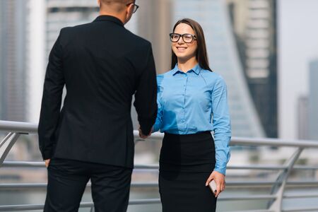 Business man and woman team at office handshakeの写真素材