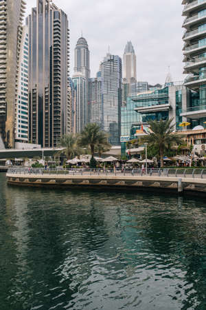 Dubai, United Arab Emirates - December, 2019: Dubai Marina canal and promenade in beautiful summer dayのeditorial素材