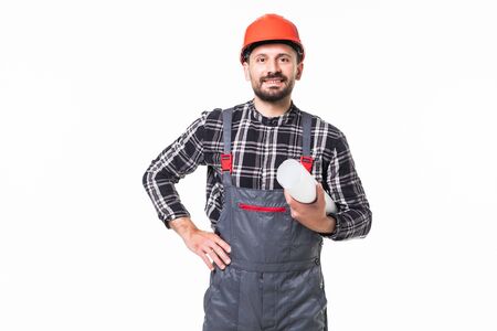 Happy smiling builder in helmet with blueprint over white background