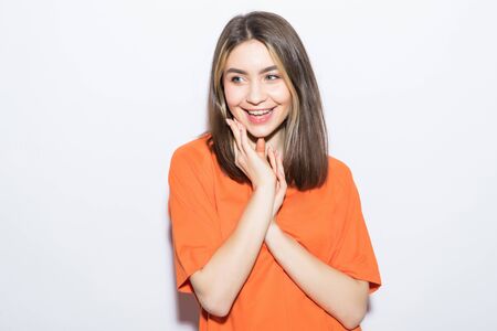 Young smile woman standing against white background.の写真素材