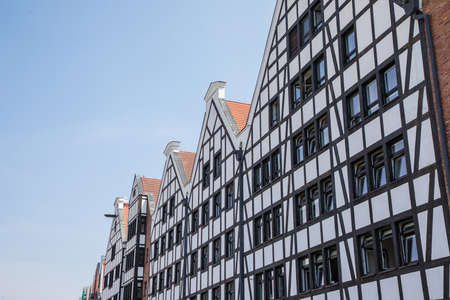 Gdansk, Poland - Jun, 2019:. Beautiful multi-colored houses in the old town in Gdansk. The central streets of the historic center of Gdansk.のeditorial素材