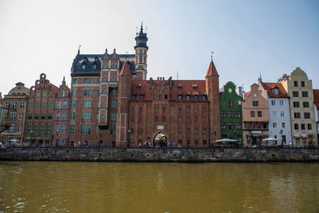 Gdansk, Poland - Jun, 2019: Motlawa river with old town architecture background in Gdansk of Poland