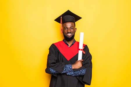 Excited graduation african man isolated on white backgroundの写真素材