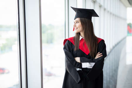Woman portrait on her graduation day. University. Education, graduation and people concept.の写真素材