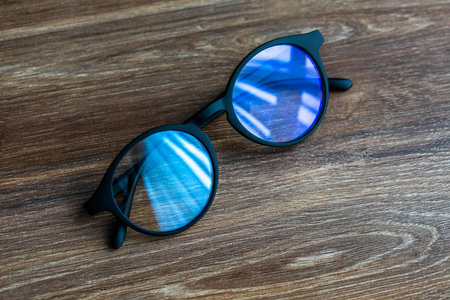 Glasses on the wooden office table