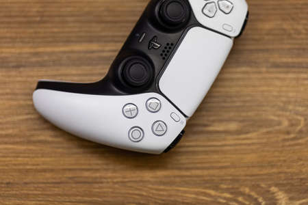 Chernivtsi, Ukraine - March, 2021: Extreme close up parts of joystick from new Sony PlayStation 5...