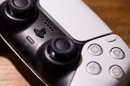 Chernivtsi, Ukraine - March, 2021: Extreme close up parts of joystick from new Sony PlayStation 5 set-top box.のeditorial素材