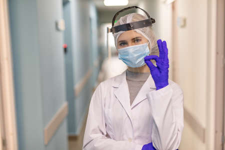 Covid-19, preventing virus, healthcare workers and vaccination concept. Doctor keep situation under...