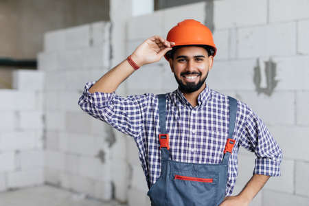 Portrait of construction young worker on building siteの写真素材