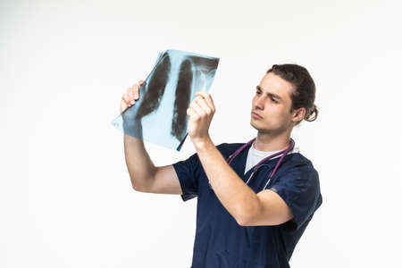 doctor looking at a xray in a white background