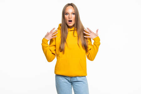 Surprised woman looking sideways in excitement. Isolated on white backgroundの写真素材