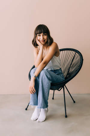 Happy young woman relaxing at homeの写真素材