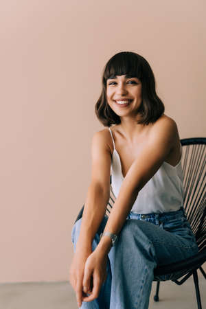 Happy young woman relaxing at homeの写真素材