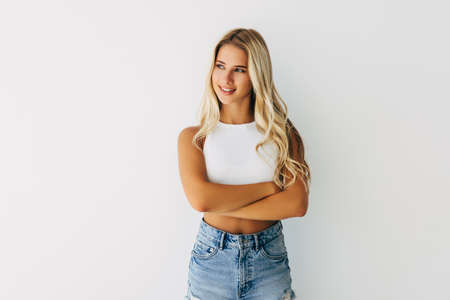 Close-up photo of pretty charming lady standing isolated gray background copyspaceの写真素材