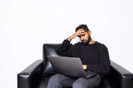Confused businessman freelancer feel irritated while use laptop for work at home.