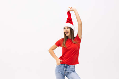 Christmas woman in Santa hat portrait isolated on white background.の写真素材