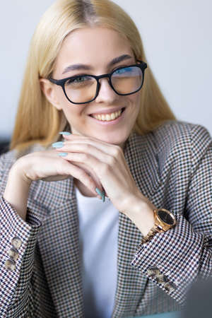 Portrait of a successful middle aged businesswoman standing at her office.
