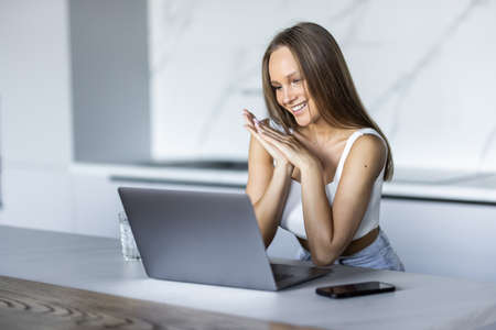Young woman working at home in the morningの写真素材