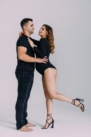 happy pregnant couple on white backgroundの写真素材