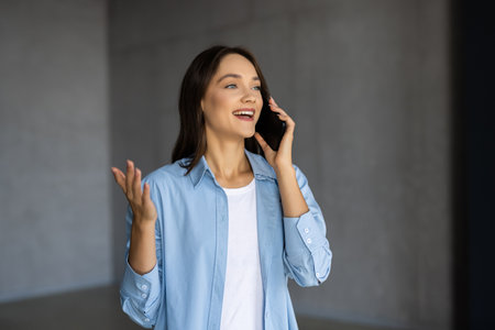 Portrait of beautiful executive professional woman making call at homeの写真素材