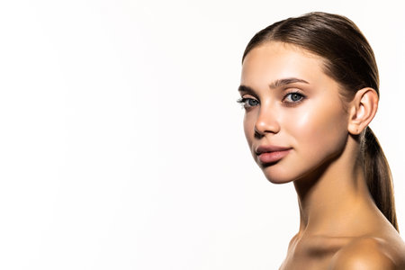 Beautiful woman with perfect makeup on white background.の写真素材