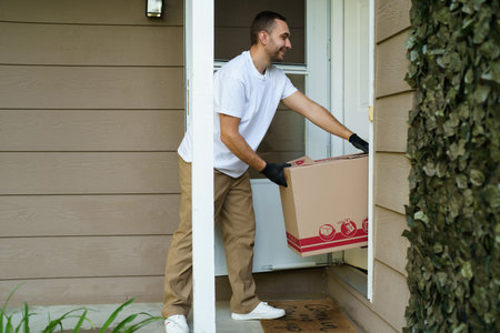 Delivery man, portrait and box with tablet for logistics, ecommerce or courier service at front...