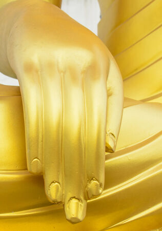 the gorgeous golden buddha hand in the templeの写真素材