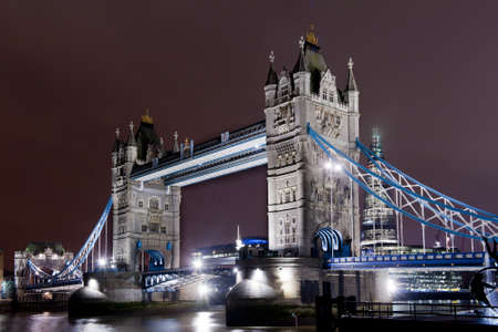 the tower bridge illuminated seen from northbankのeditorial素材