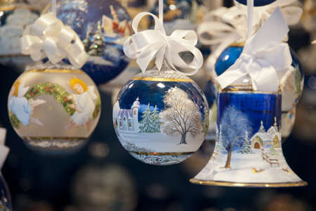 hanging decorated christmas balls and bellの写真素材