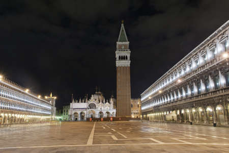 Night view of Piazza San Marco with the Campanile and the Basilica illuminated, symbols of Veniceの写真素材