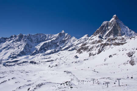 view from the Plateau Rosa over the Matterhorn valley and its slopesの写真素材