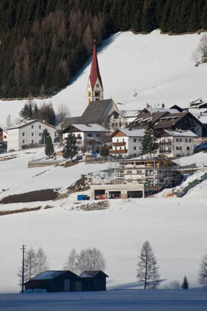 the village of kematen under the snow, in pfitsch, sudtirolの写真素材