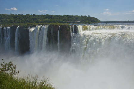 the magnificent garganta del diablo at the iguazu falls, one of the seven natural wonders of the worldの写真素材
