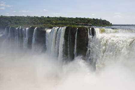 the magnificent garganta del diablo at the iguazu falls, one of the seven natural wonders of the worldの写真素材