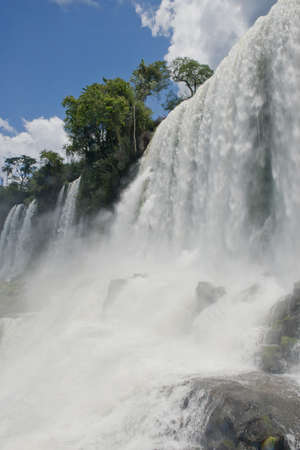 the spectacular Salto Bossetti at the Iguazu Falls, one of the seven natural wonders of the world, between Argentina and Brazilの写真素材
