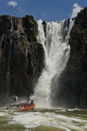 the magnificent garganta del diablo at the iguazu falls, one of the seven natural wonders of the world, between Argentina and Brazilのeditorial素材