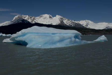 Spectacular blue iceberg floating on the Lake Argentino in the Los Glaciares National Park, Patagonia, Argentina.の写真素材