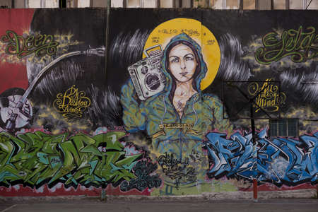 mural painting representing the Madonna with a stereo in the barrio San Telmo, in the centre of Buenos Airesのeditorial素材