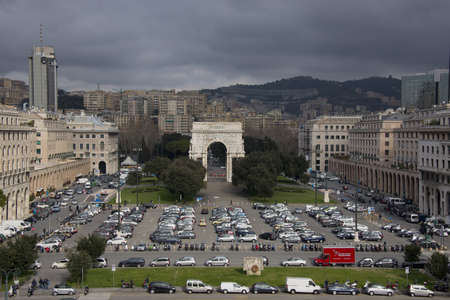 View of Piazza della Vittoria, with the triumphal arch built during the fascist period, in the center of Genoaのeditorial素材