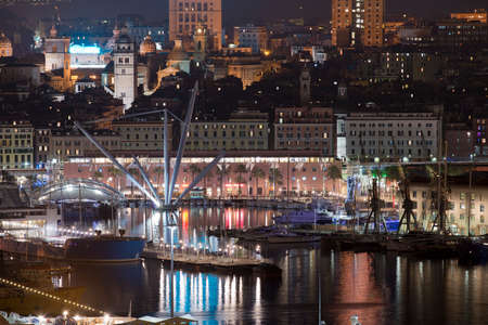 View of the harbour of Genoa illuminated by nightの写真素材