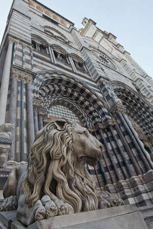 Lion on the facade of the cathedral of San Lorenzo in the center of Genoa, Italy