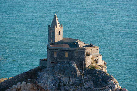 The historical church of San Pietro situated on the promontory of Portovenere, facing Palmaria Island  This typical fishing village is Unesco world heritage site since 1997 のeditorial素材