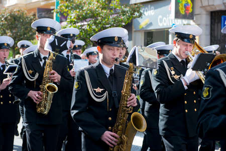 MENTON, FRANCE - 2 MARCH 2014 - Unidentified players marching with the band in the Lemon Festival...
